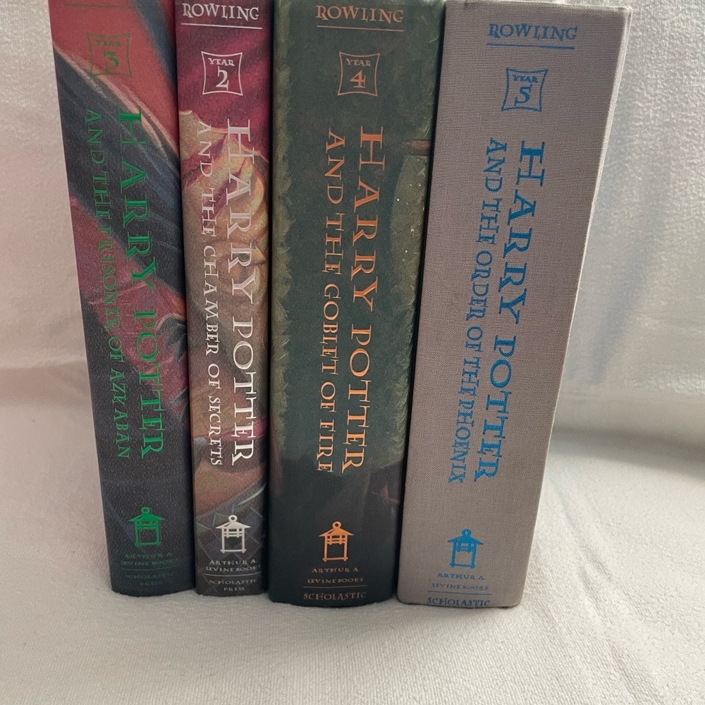 Scholastic Harry Potter Book Collection - Used 2 - 5 ( book 5 has no cover )